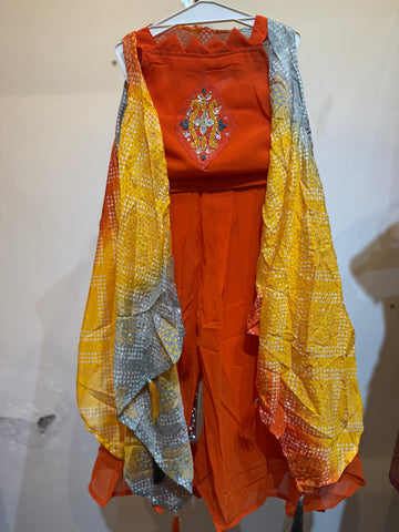 Bright orange  palazzo set with bhandhini shrug