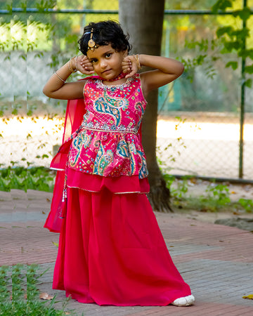 Rani pink paisley printed peplum top with palazzo pant and matching dupatta for girls