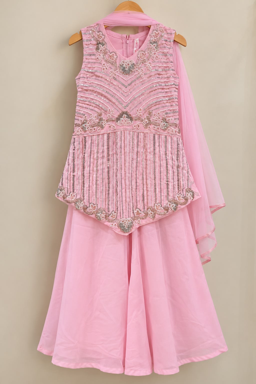 Baby pink peplum top with vertical line work and georgette  palazzo