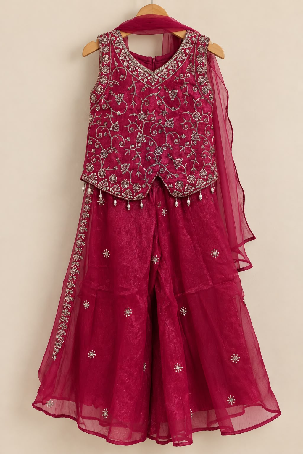 Rani pink all over embroidered heavy silver zari and sequins work top with organza palazzo