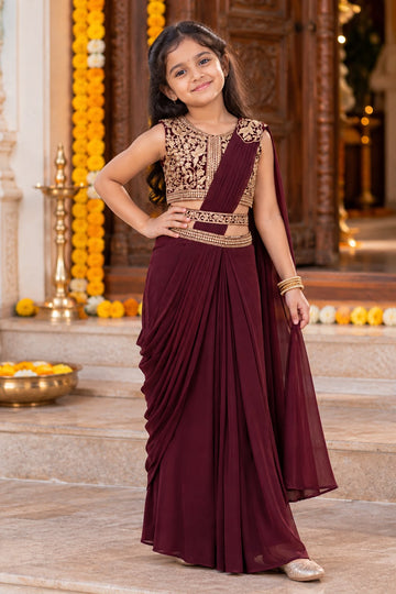 Maroon ready-to-wear saree drape with embroidered crop top blouse